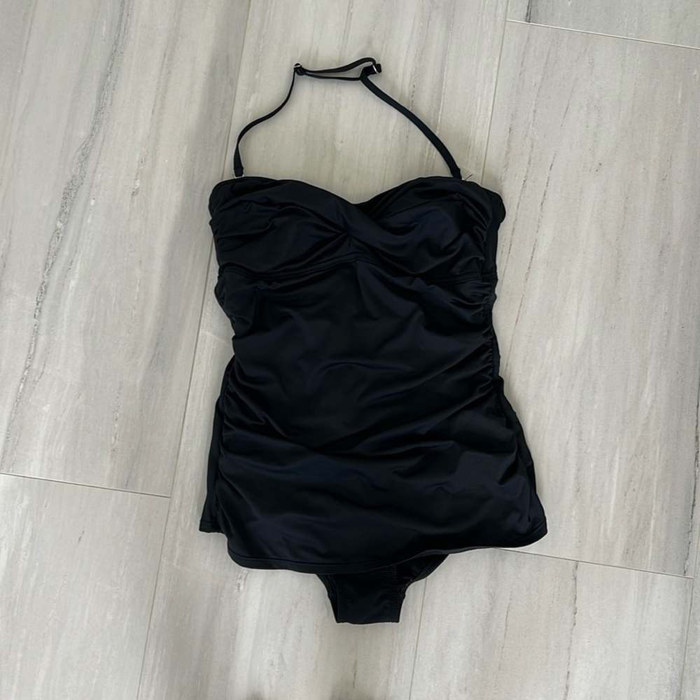Black one piece strapless swimsuit. Size 12. Never worn
